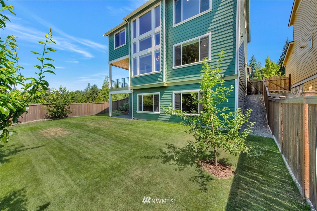27418 Northeast 152nd Court Duvall, WA 98019 - Photo 32 of 40 a front view of a house with a yard