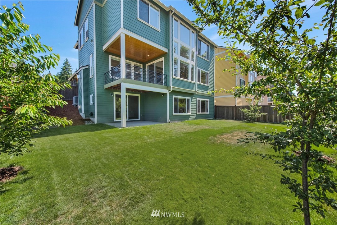 27418 Northeast 152nd Court Duvall, WA 98019 - Photo 33 of 40 a view of an apartment building with a yard