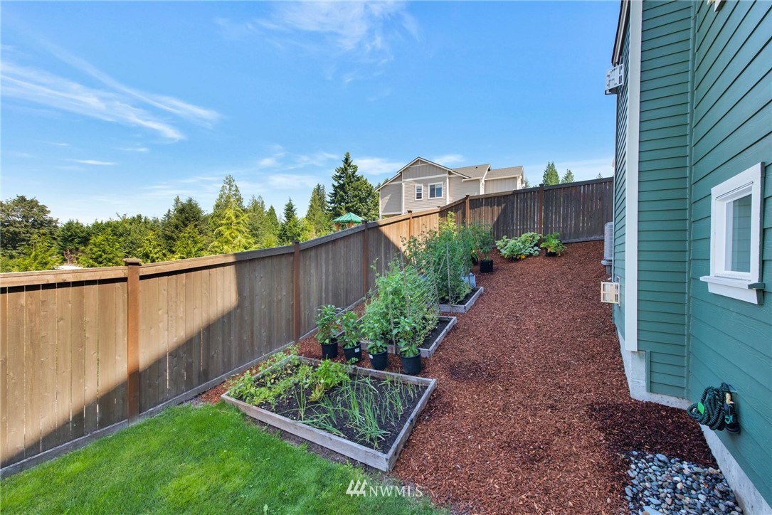 27418 Northeast 152nd Court Duvall, WA 98019 - Photo 34 of 40 a view of a backyard with plants