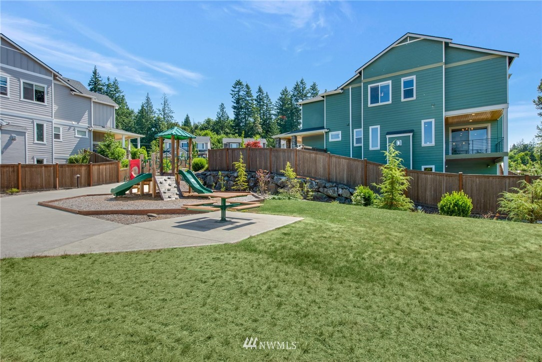 27418 Northeast 152nd Court Duvall, WA 98019 - Photo 36 of 40 a view of a park with swings and slides
