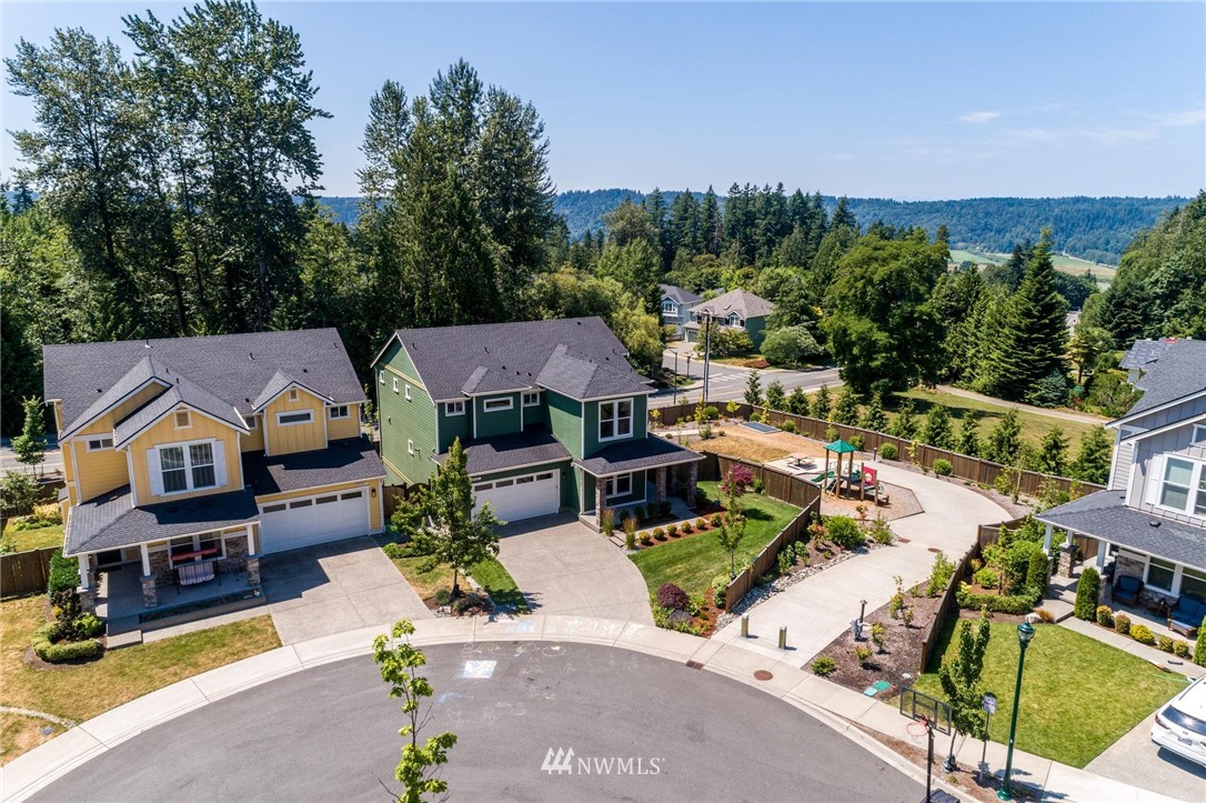 27418 Northeast 152nd Court Duvall, WA 98019 - Photo 38 of 40 an aerial view of residential houses and outdoor space