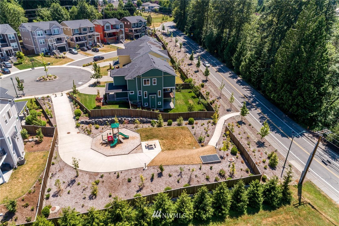 27418 Northeast 152nd Court Duvall, WA 98019 - Photo 40 of 40 a aerial view of a house with garden space and street view