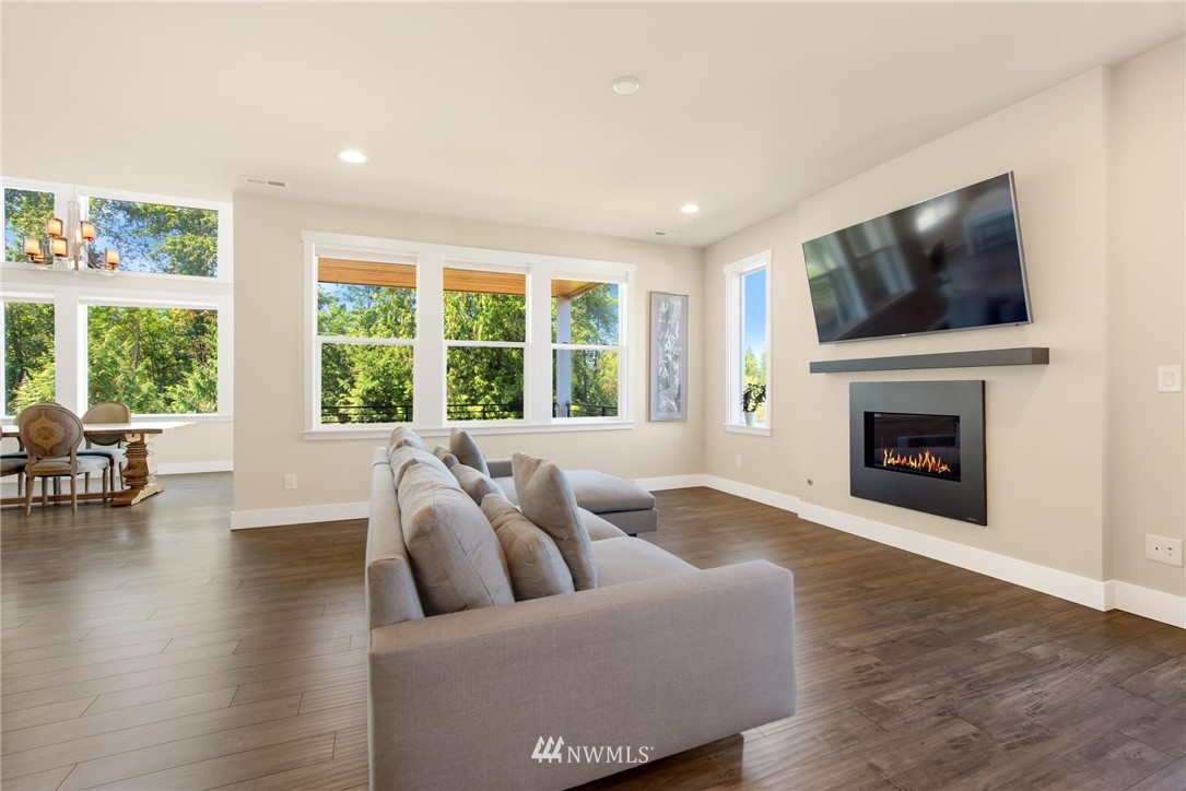 27418 Northeast 152nd Court Duvall, WA 98019 - Photo 10 of 40 a living room with furniture window and a flat screen tv