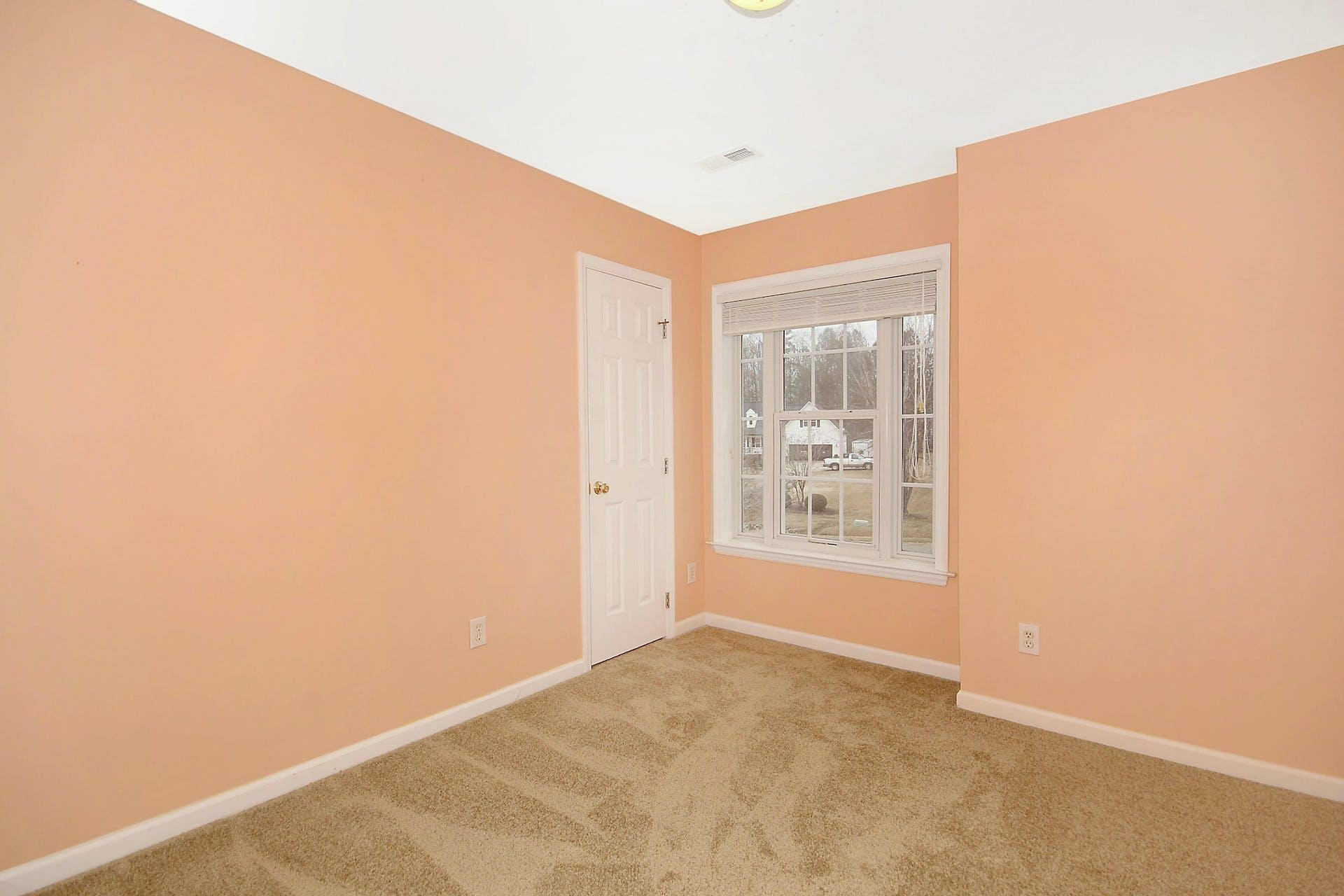 143 Susan Drive Garner, NC 27529 - Photo 20 of 27 a view of an empty room with a window