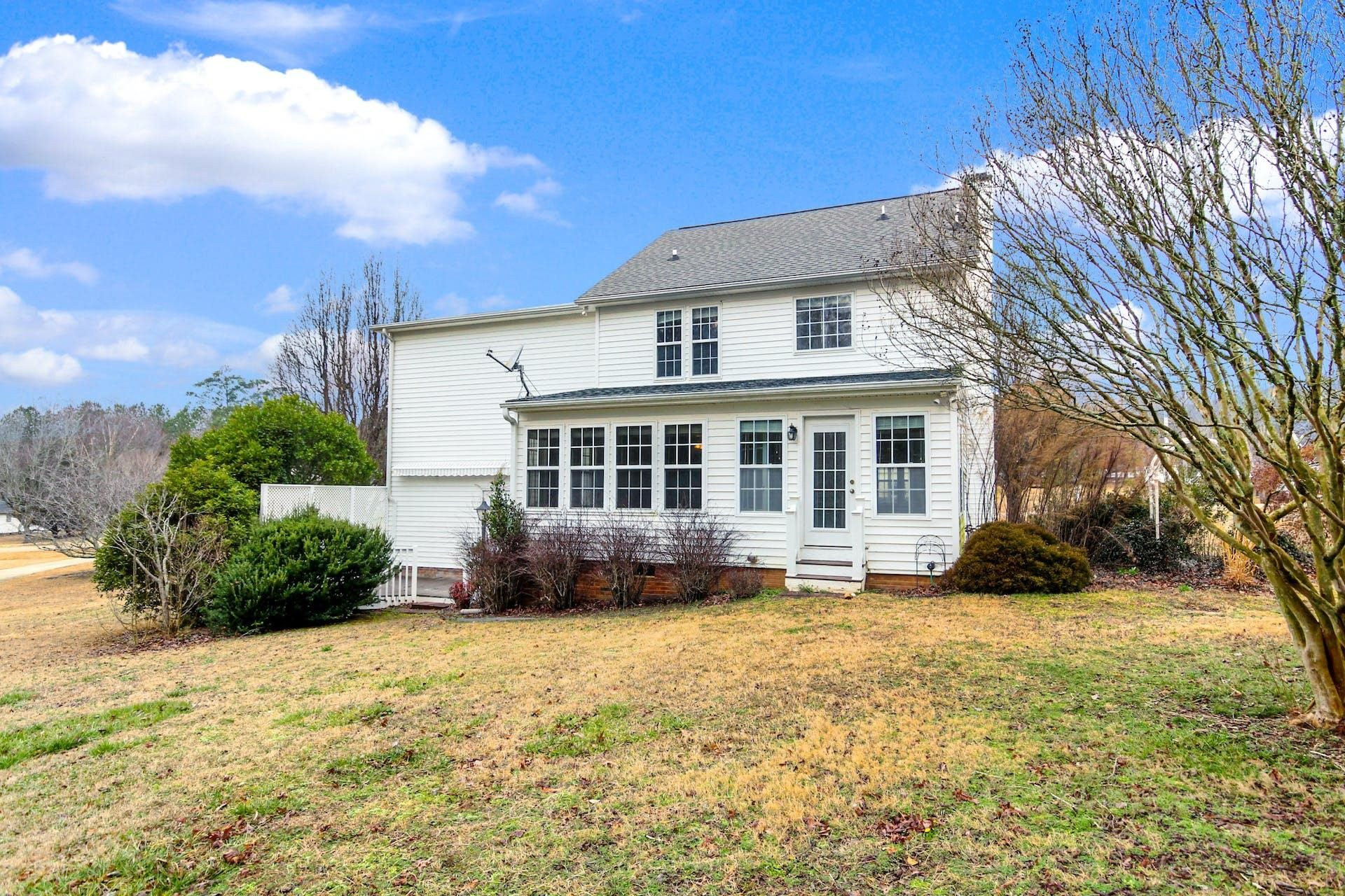 143 Susan Drive Garner, NC 27529 - Photo 24 of 27 a front view of a house with a yard
