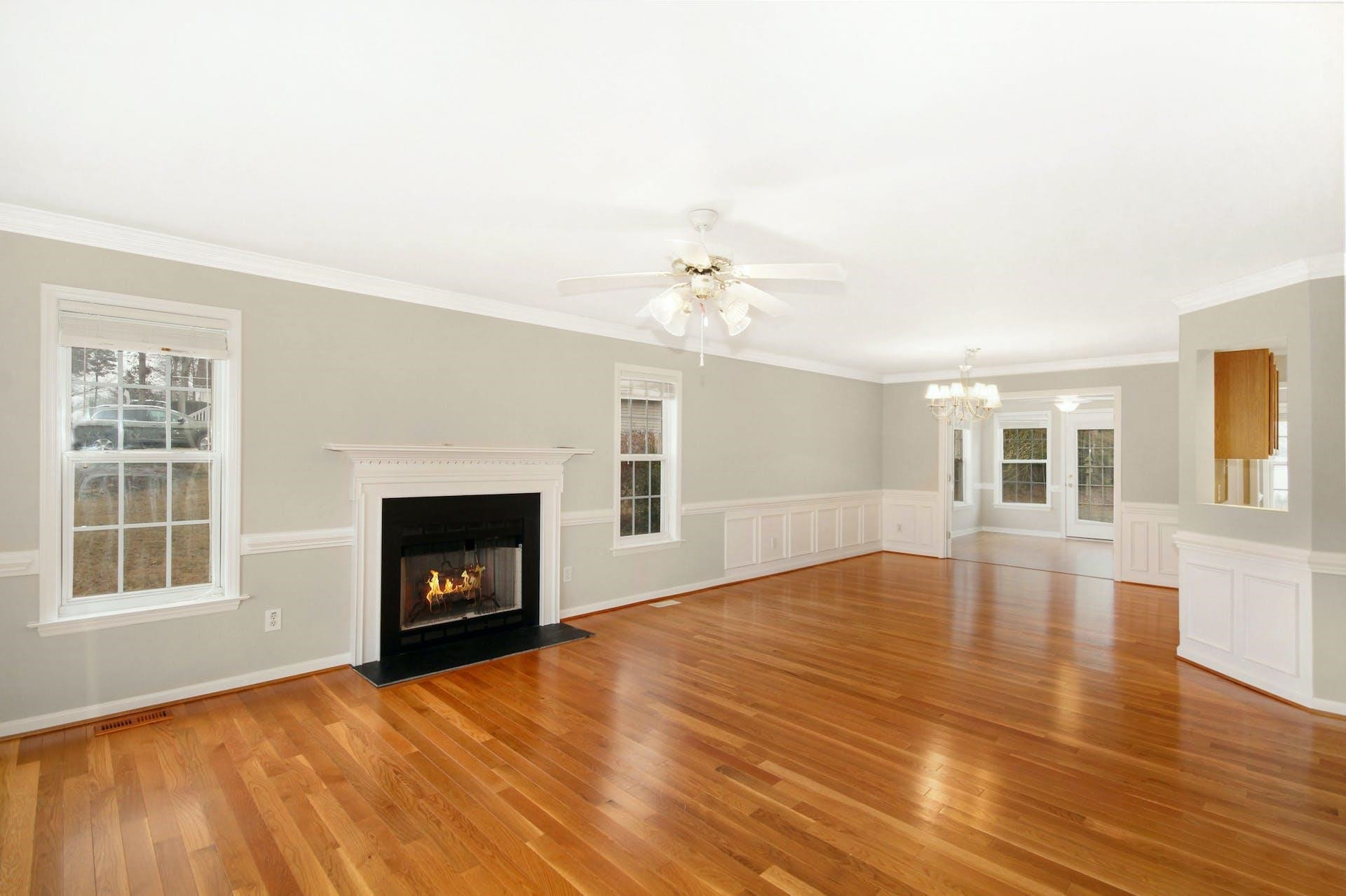 143 Susan Drive Garner, NC 27529 - Photo 4 of 27 a view of an empty room with window and fire place