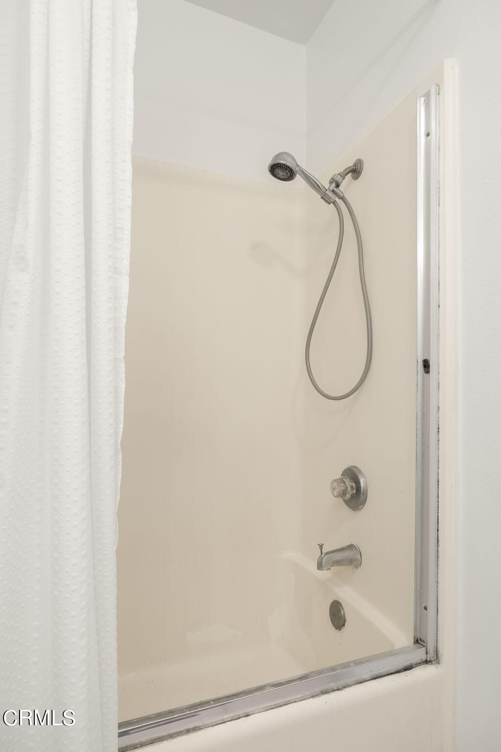 1440 Friedrich Lane, Unit C Oxnard, CA 93033 - Photo 18 of 30 a bathroom with a glass shower door and a shower