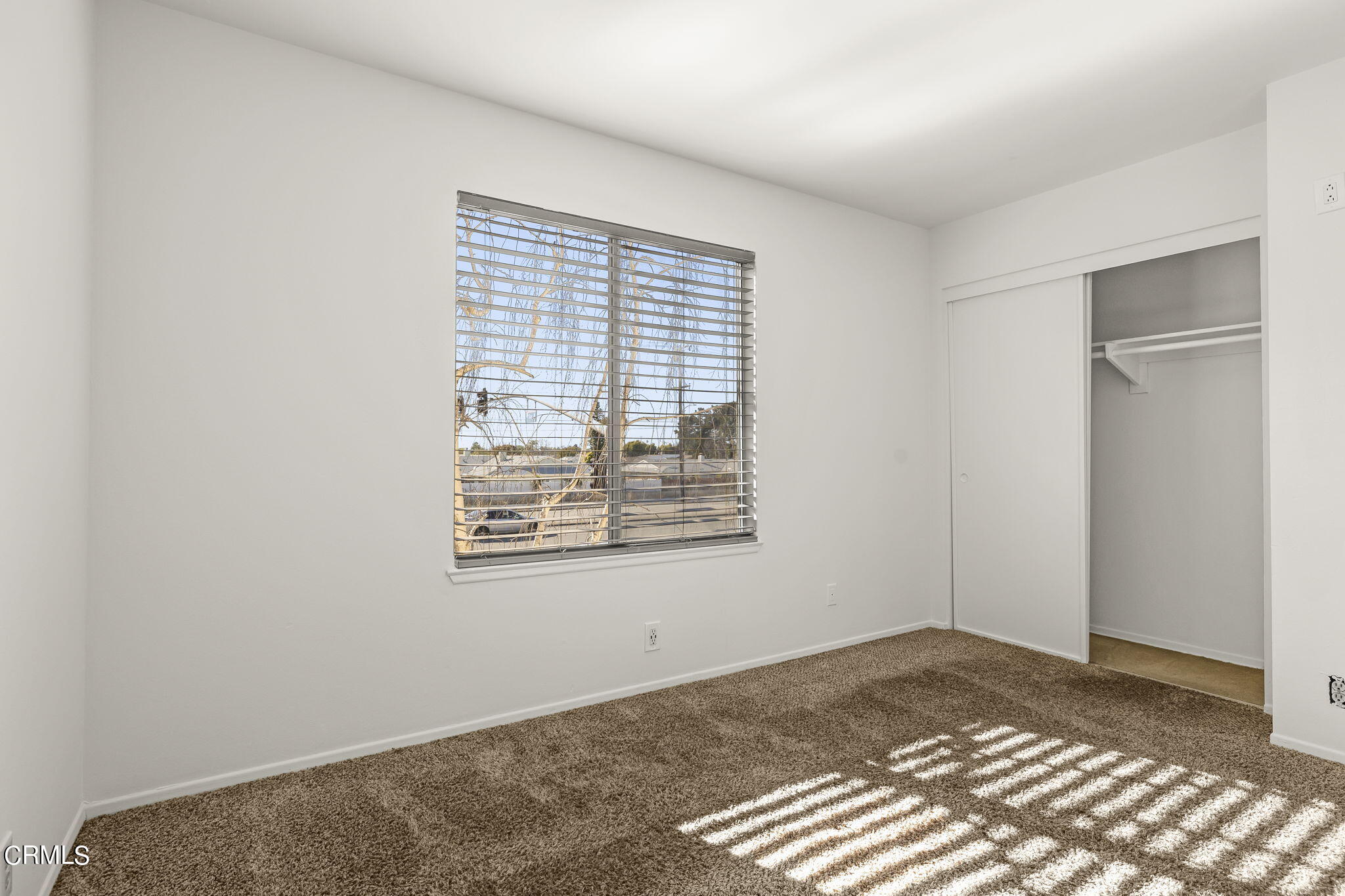1440 Friedrich Lane, Unit C Oxnard, CA 93033 - Photo 22 of 30 a view of an empty room and window