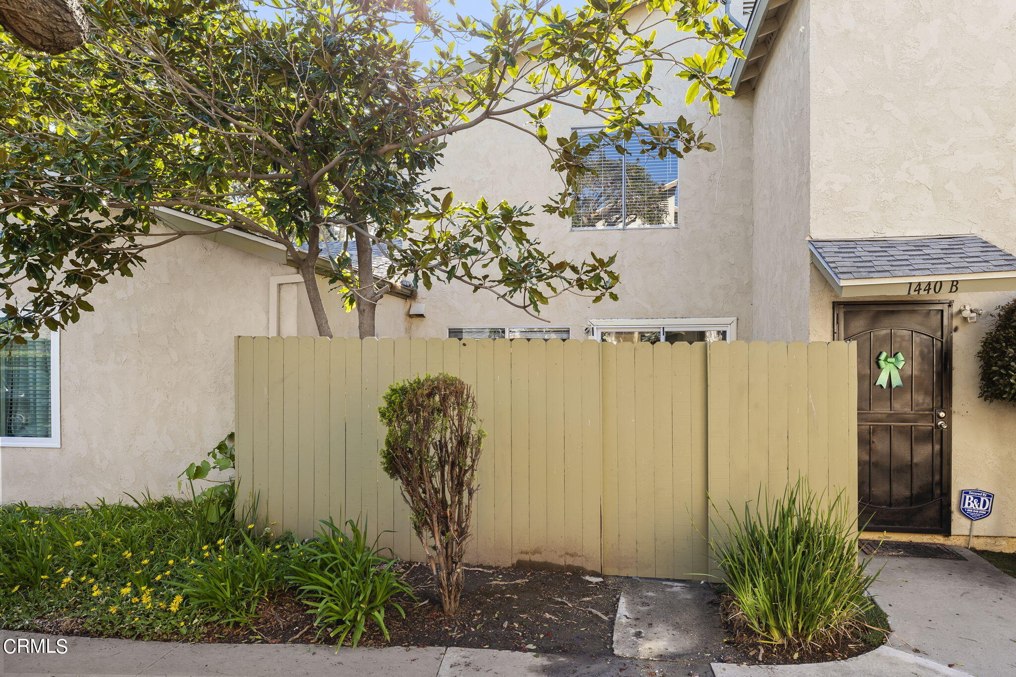 1440 Friedrich Lane, Unit C Oxnard, CA 93033 - Photo 27 of 30 a sign that is sitting on the side of a road