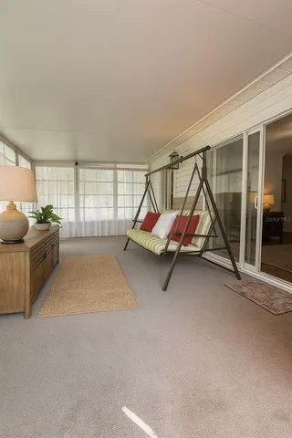 a house with wooden floor and windows