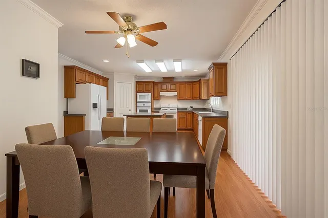a view of kitchen with cabinets and wooden floor