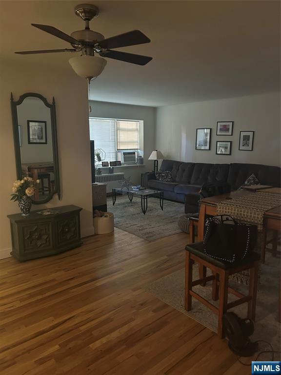 280-320 Oak Street, Unit 280A Ridgewood, NJ 07450 - Photo 4 of 24 a living room with furniture and a wooden floor