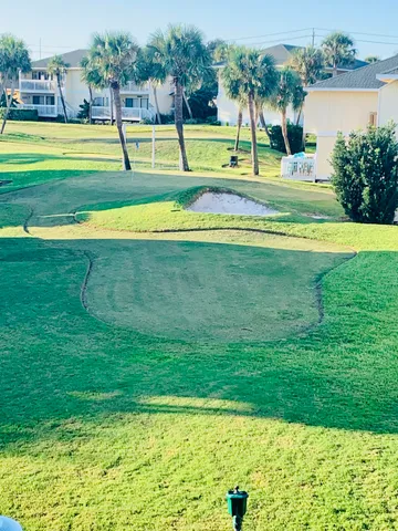 a view of a yard with a bench