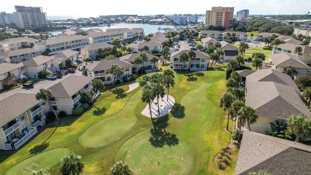 an aerial view of a house with outdoor space