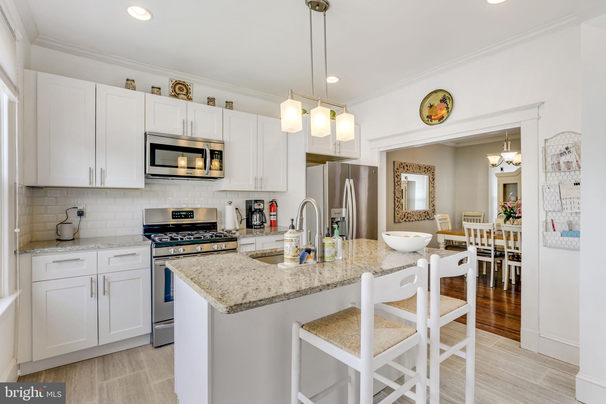 523 Elmwood Road Baltimore, MD 21206 - Photo 20 of 48 Kitchen opens to dining room