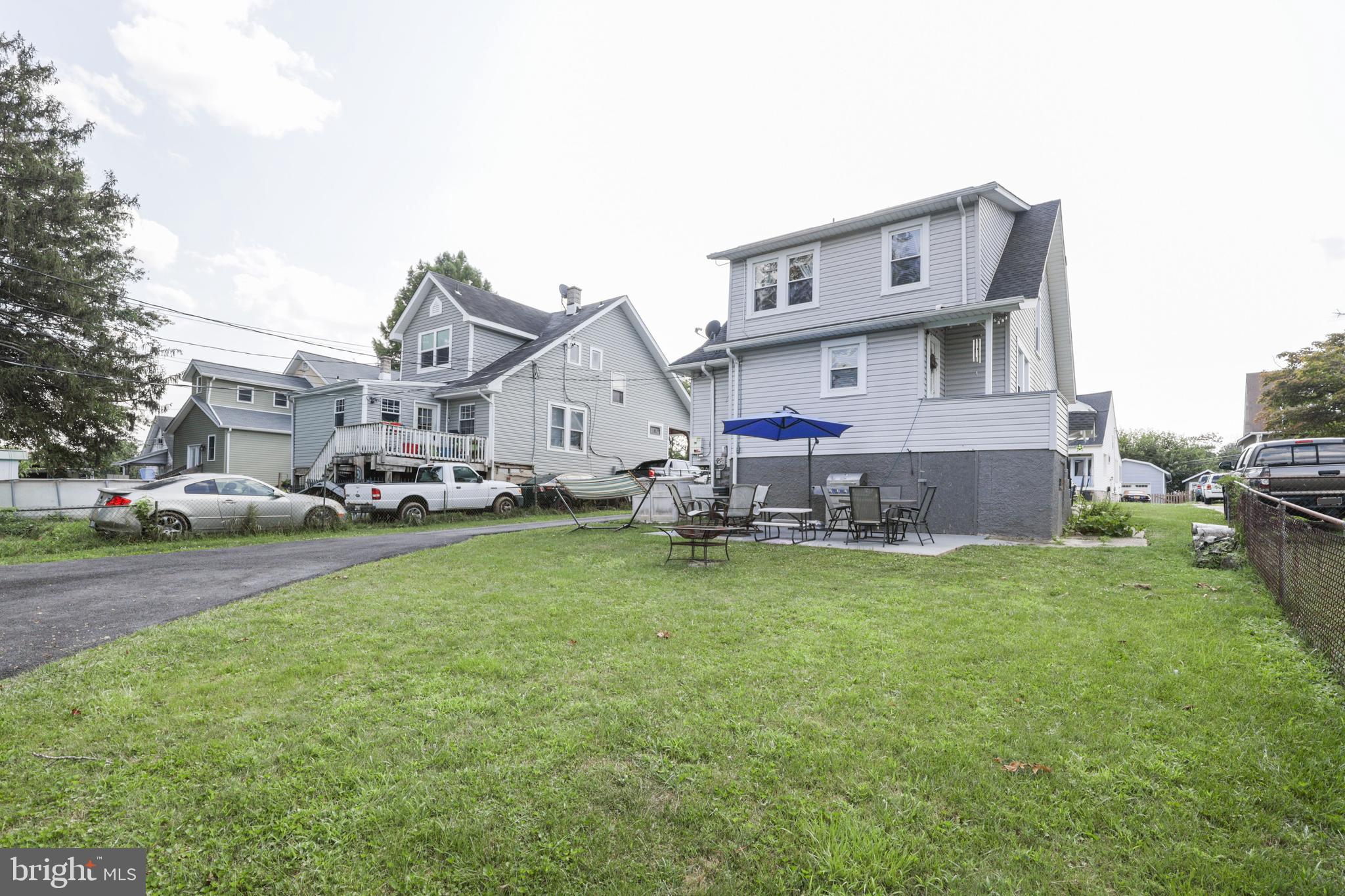 523 Elmwood Road Baltimore, MD 21206 - Photo 5 of 48 Large rear yard with patio, green space, & parking
