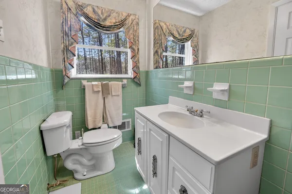 $775,000 | 881 Rockbridge Road Southwest, Lilburn, GA 30047