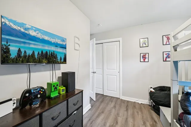 a room with furniture and wooden floor