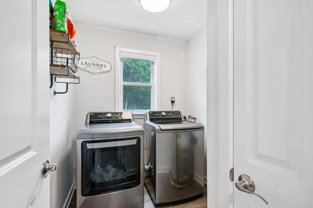 a stove top oven sitting inside of a kitchen