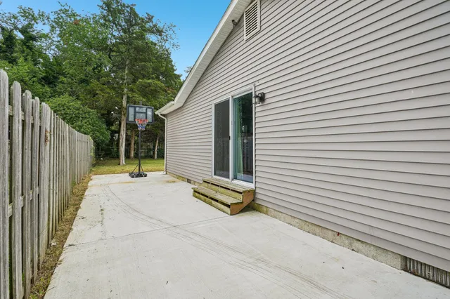 a view of a street with a garage