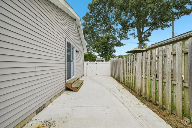 a view of a back yard of the house