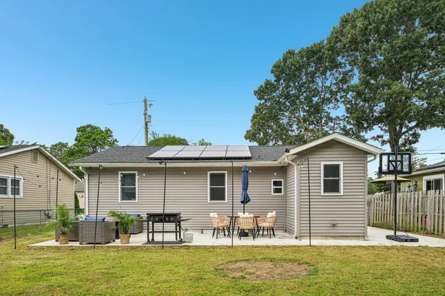 a front view of house with yard porch and furniture
