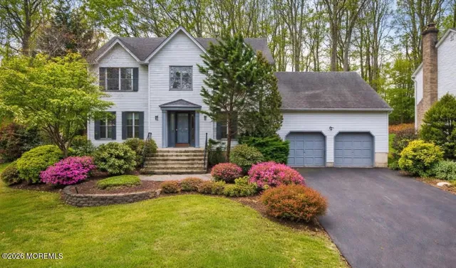 a front view of a house with yard
