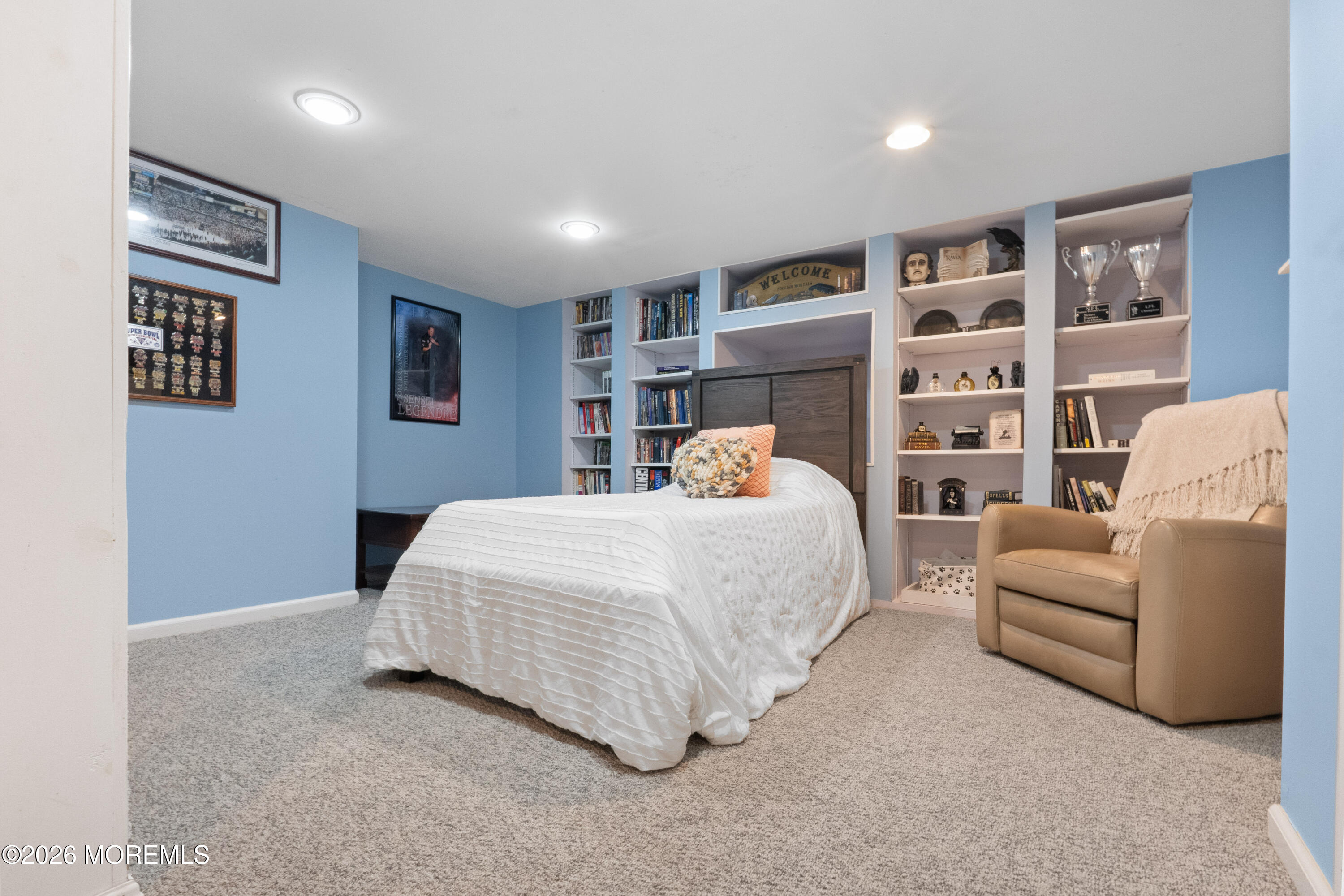 25 Cherokee Road East Brunswick, NJ 08816 - Photo 31 of 34 a bedroom with a bed and a couch
