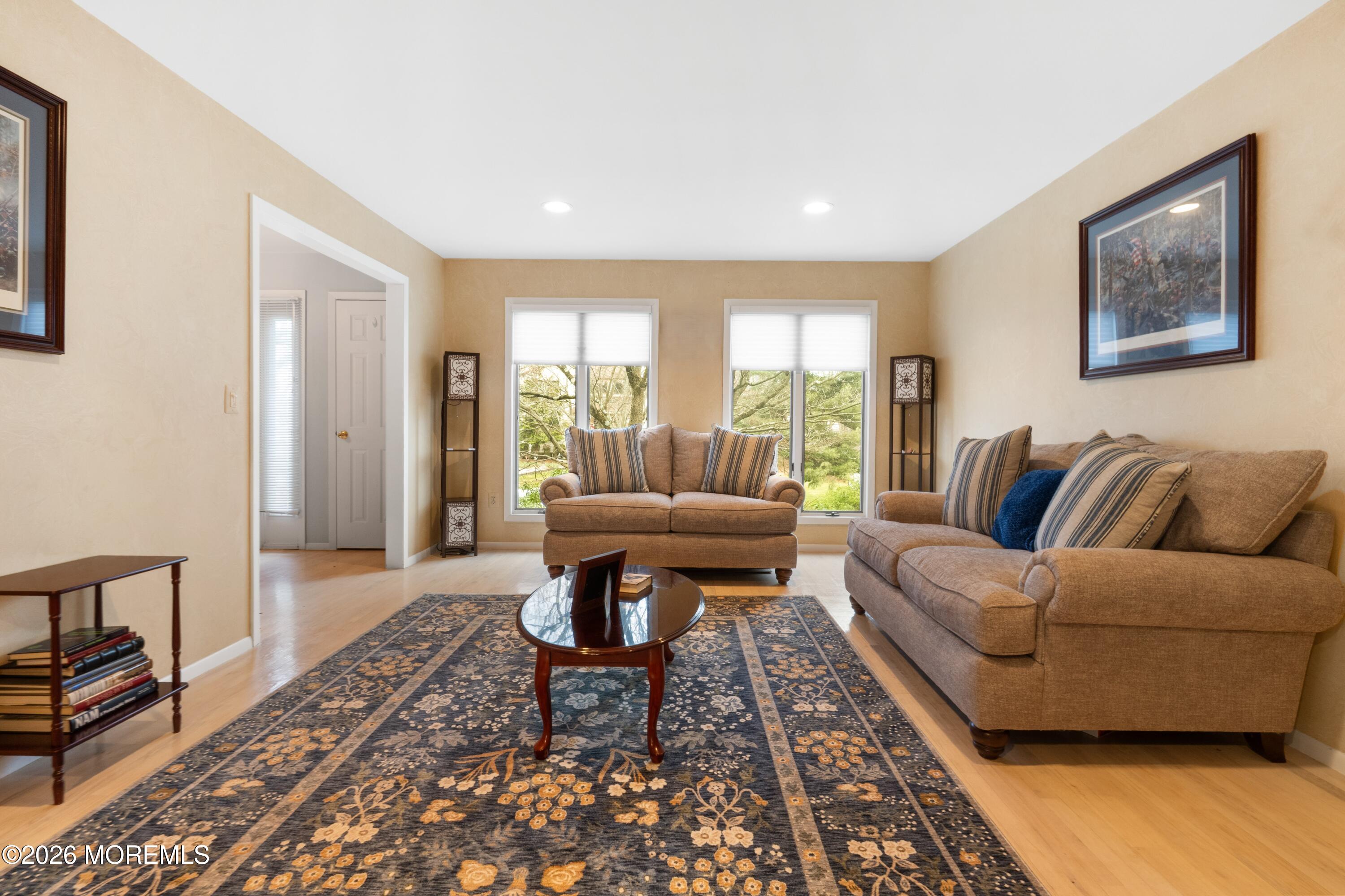 25 Cherokee Road East Brunswick, NJ 08816 - Photo 7 of 34 a living room with furniture and a rug