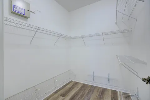 a view of a room with racks on the wall