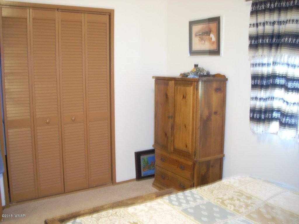 2963 Hunters Road Overgaard, AZ 85933 - Photo 13 of 19 a view of a livingroom with furniture