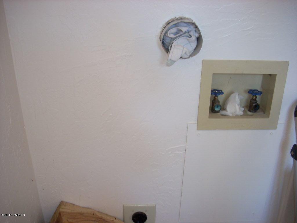 2963 Hunters Road Overgaard, AZ 85933 - Photo 14 of 19 a view of a small space with a mirror