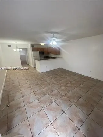 a view of a livingroom with a furniture