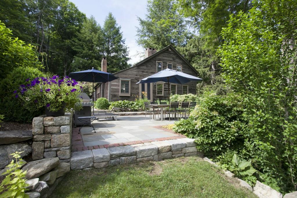 37 Berry Road Roxbury, CT 06783 - Photo 1 of 1 a front view of a house with a yard and fountain