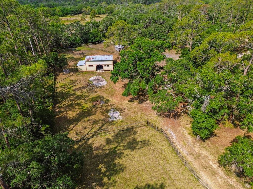 2853 Saffold Road Wimauma, FL 33598 - Photo 55 of 62 an aerial view of residential house with green space