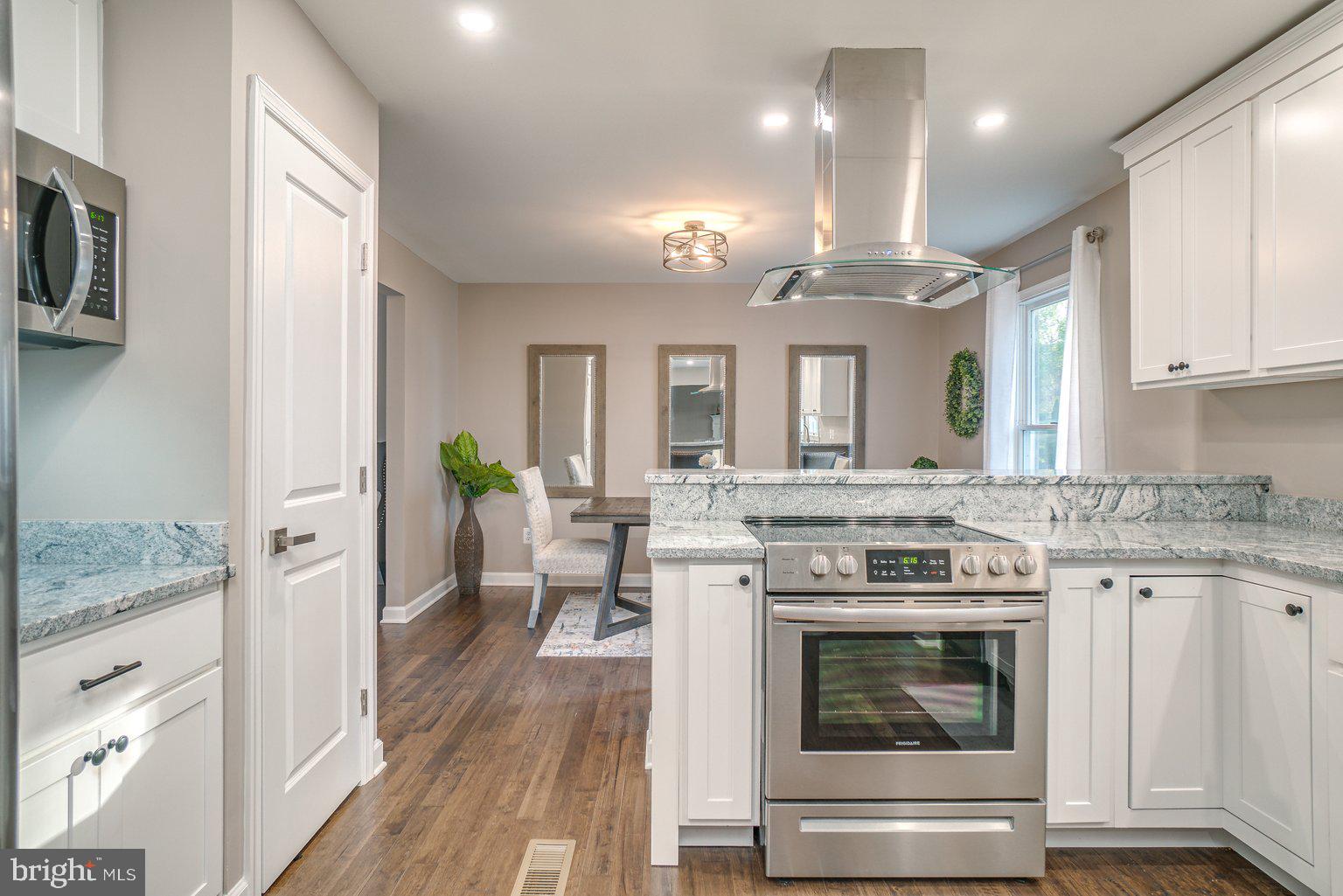 9316 Ramblebrook Road Baltimore, MD 21236 - Photo 12 of 41 Stove / Oven & Stainless Range Hood