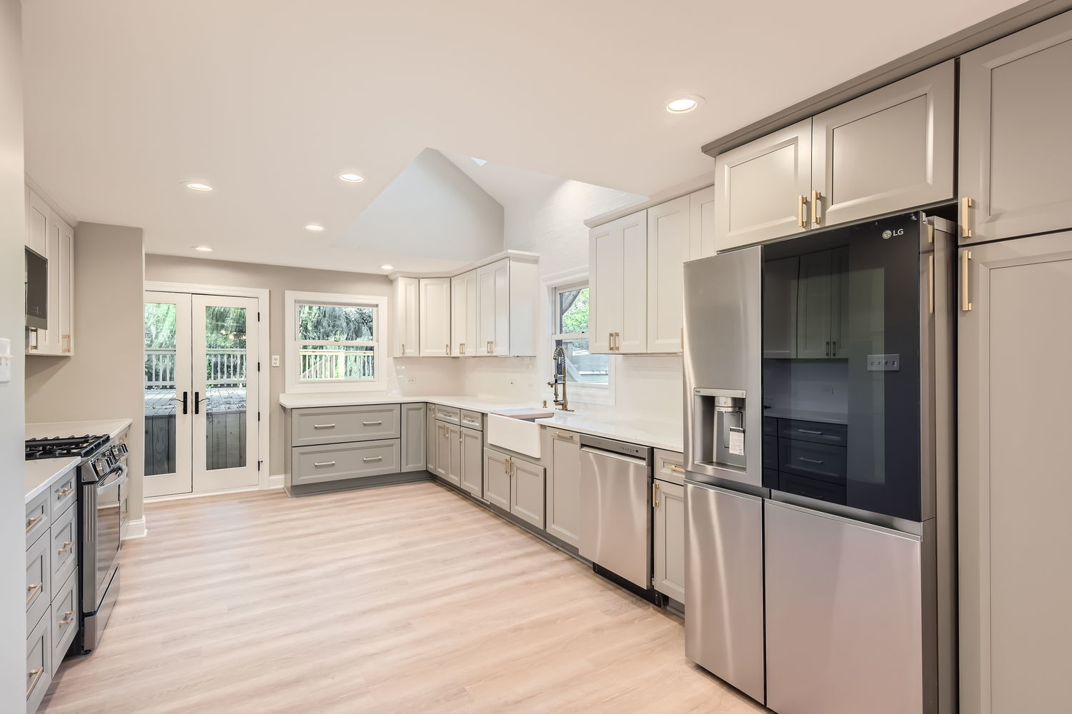 386 Blackhawk Road Riverside, IL 60546 - Photo 11 of 44 a kitchen with stainless steel appliances a refrigerator and a stove top oven