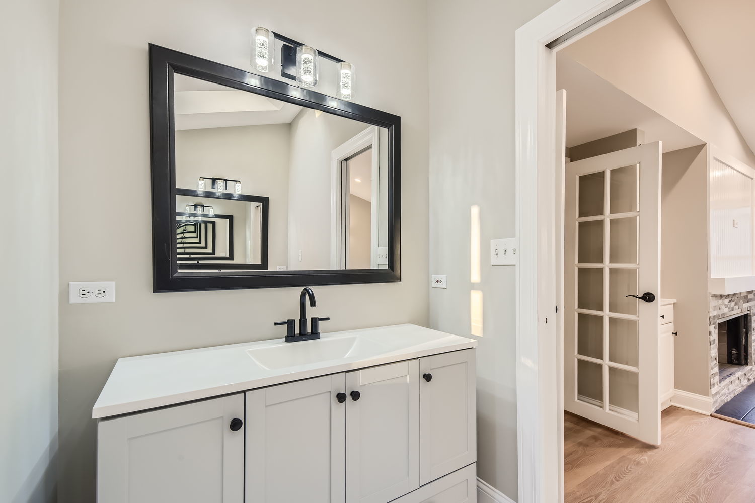 386 Blackhawk Road Riverside, IL 60546 - Photo 25 of 44 a bathroom with a sink and a mirror