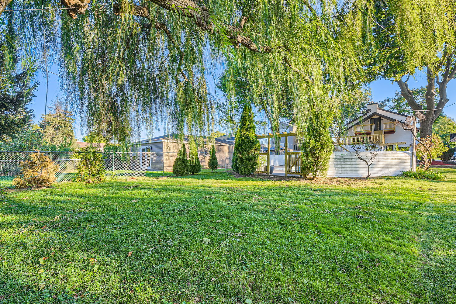 386 Blackhawk Road Riverside, IL 60546 - Photo 39 of 44 a view of a backyard with a garden