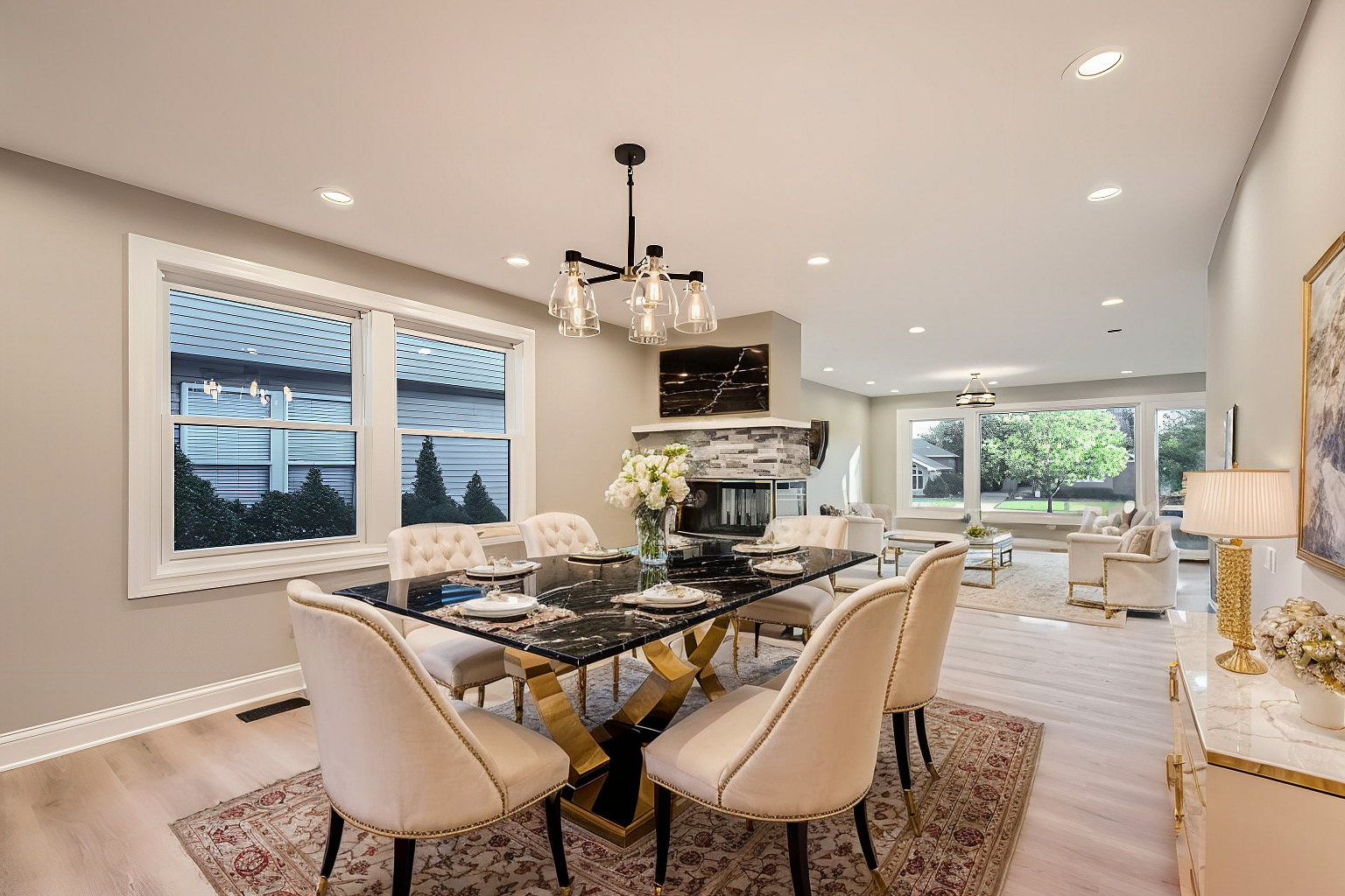386 Blackhawk Road Riverside, IL 60546 - Photo 9 of 44 a view of a dining room with furniture window and outside view