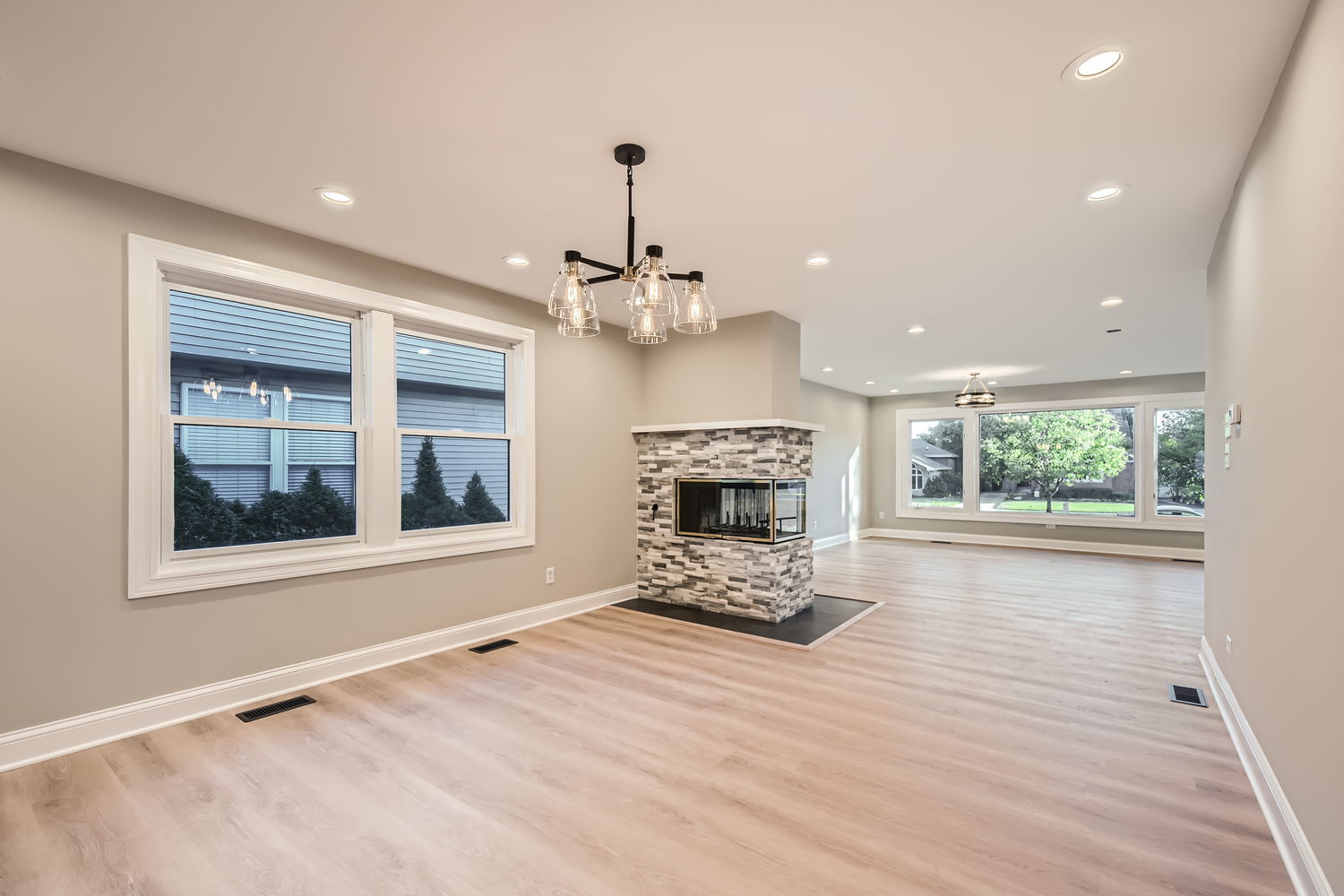 386 Blackhawk Road Riverside, IL 60546 - Photo 10 of 44 a view of a livingroom with a window and fireplace