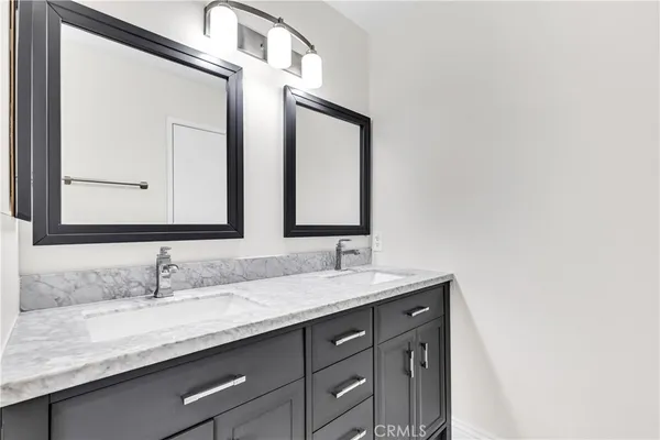 a view of a yard with a large tree