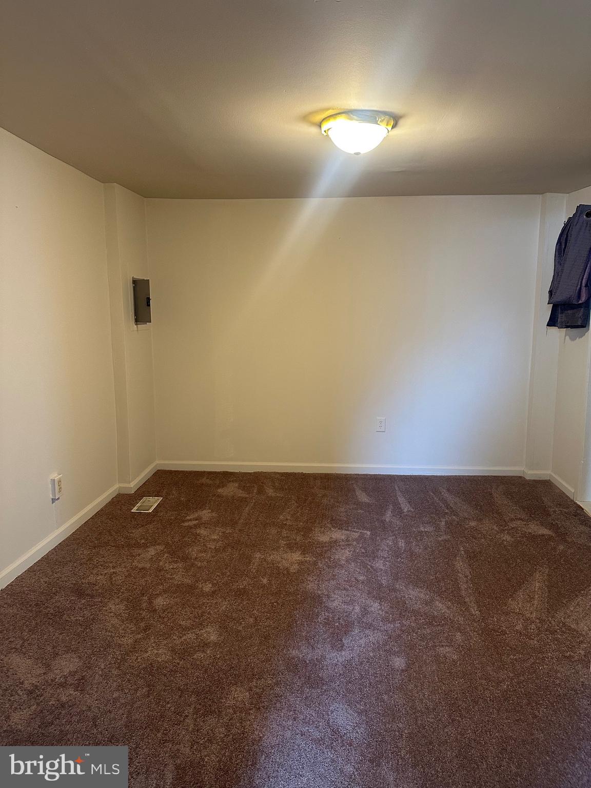 615 5th Street, Unit 1 Lancaster, PA 17603 - Photo 5 of 5 a view of an empty room and a lamp