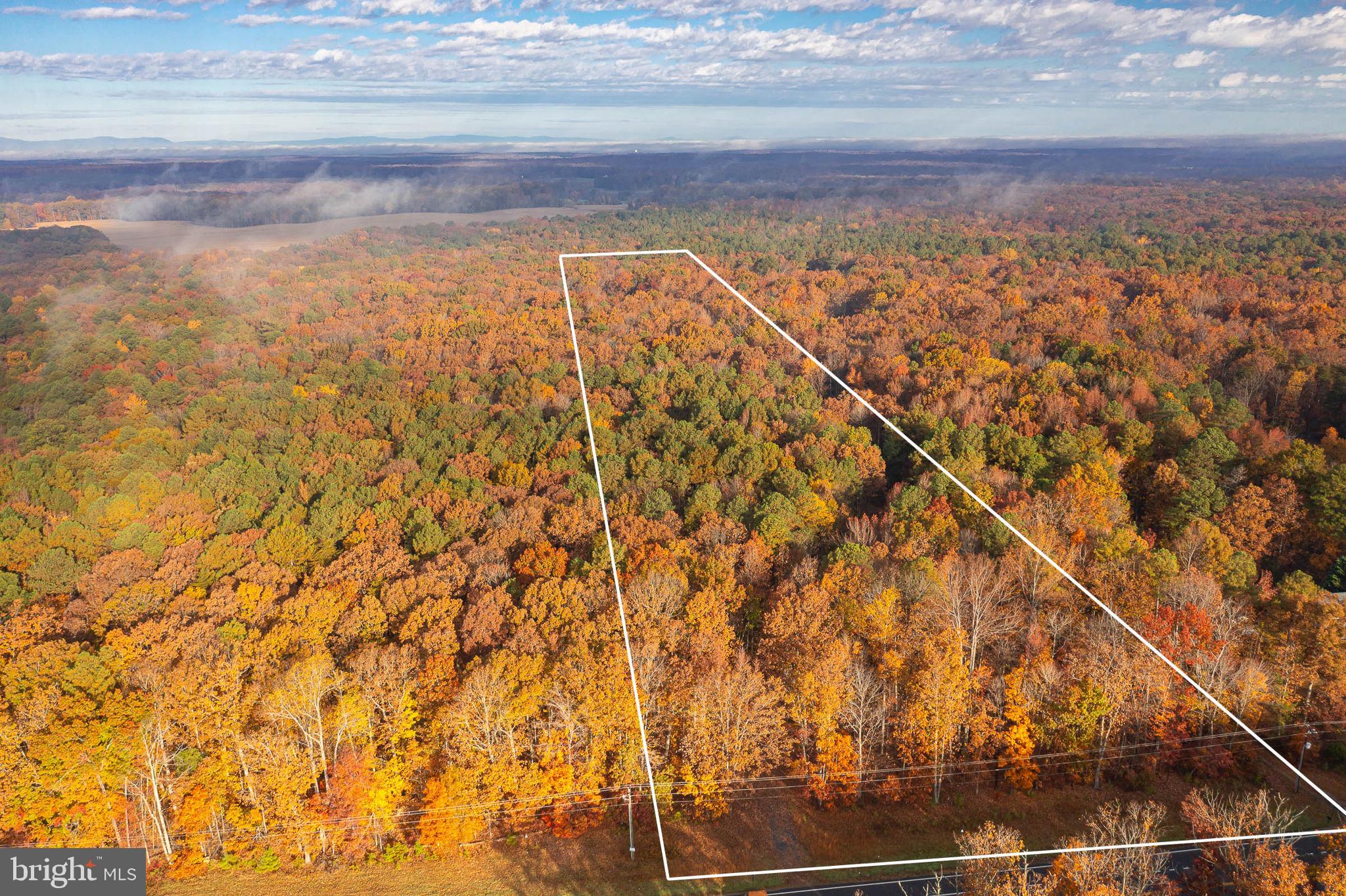 This 9.3 acre lot is dividable.