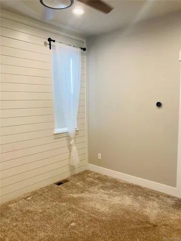a bathroom with a sink mirror and vanity