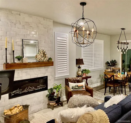 a balcony with table and chairs