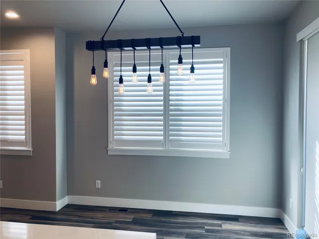 a view of a room that has a window