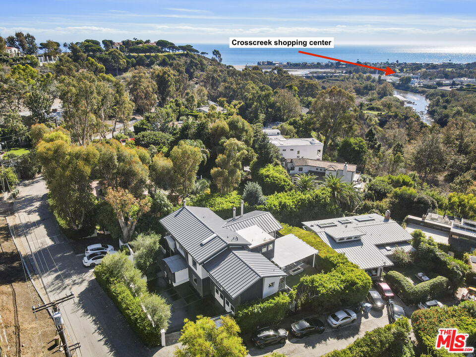 3631 Serra Road Malibu, CA 90265 - Photo 3 of 74 an aerial view of a house with a yard basket ball court and outdoor seating