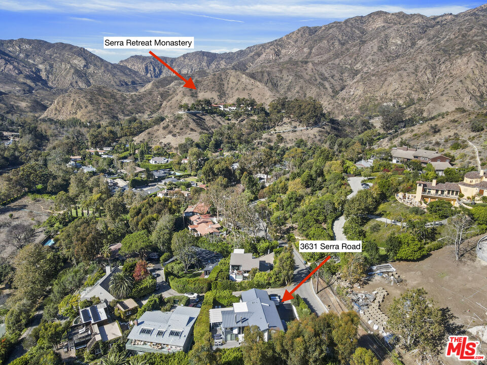 3631 Serra Road Malibu, CA 90265 - Photo 4 of 74 an aerial view of a houses with a yard