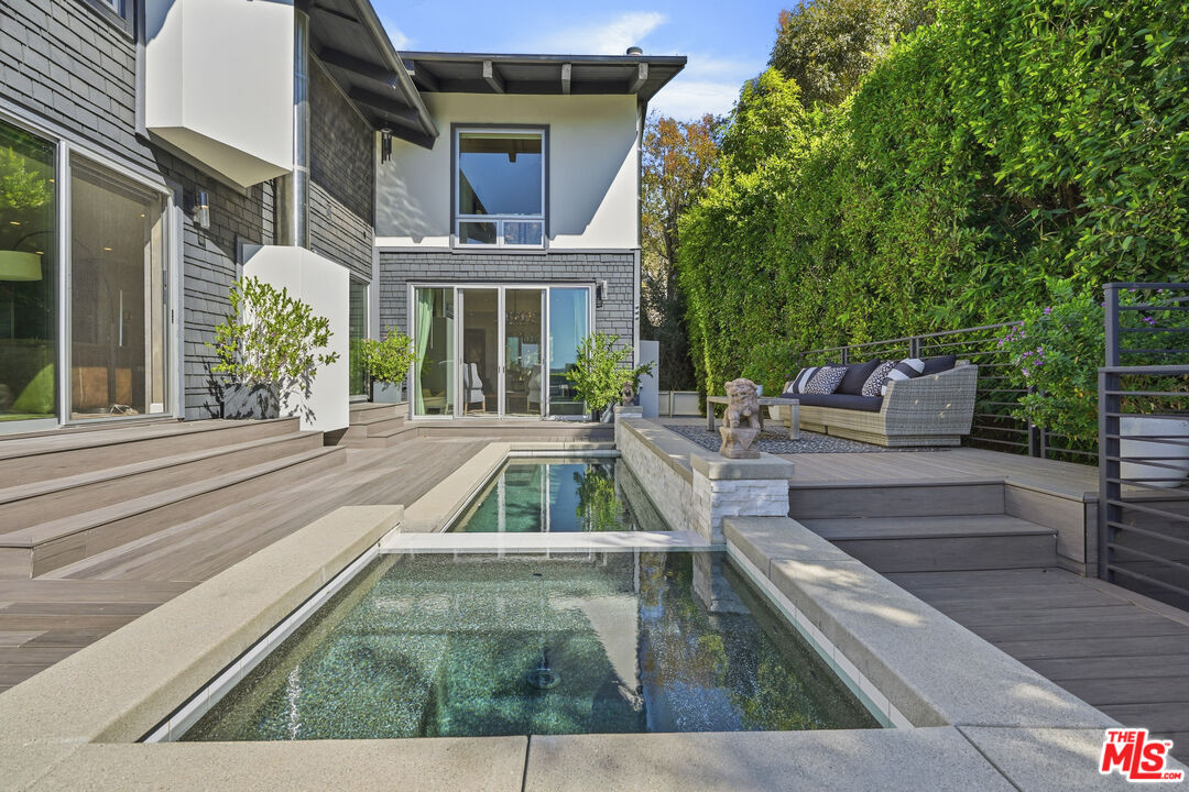 3631 Serra Road Malibu, CA 90265 - Photo 55 of 74 a view of outdoor space yard deck patio and fire pit